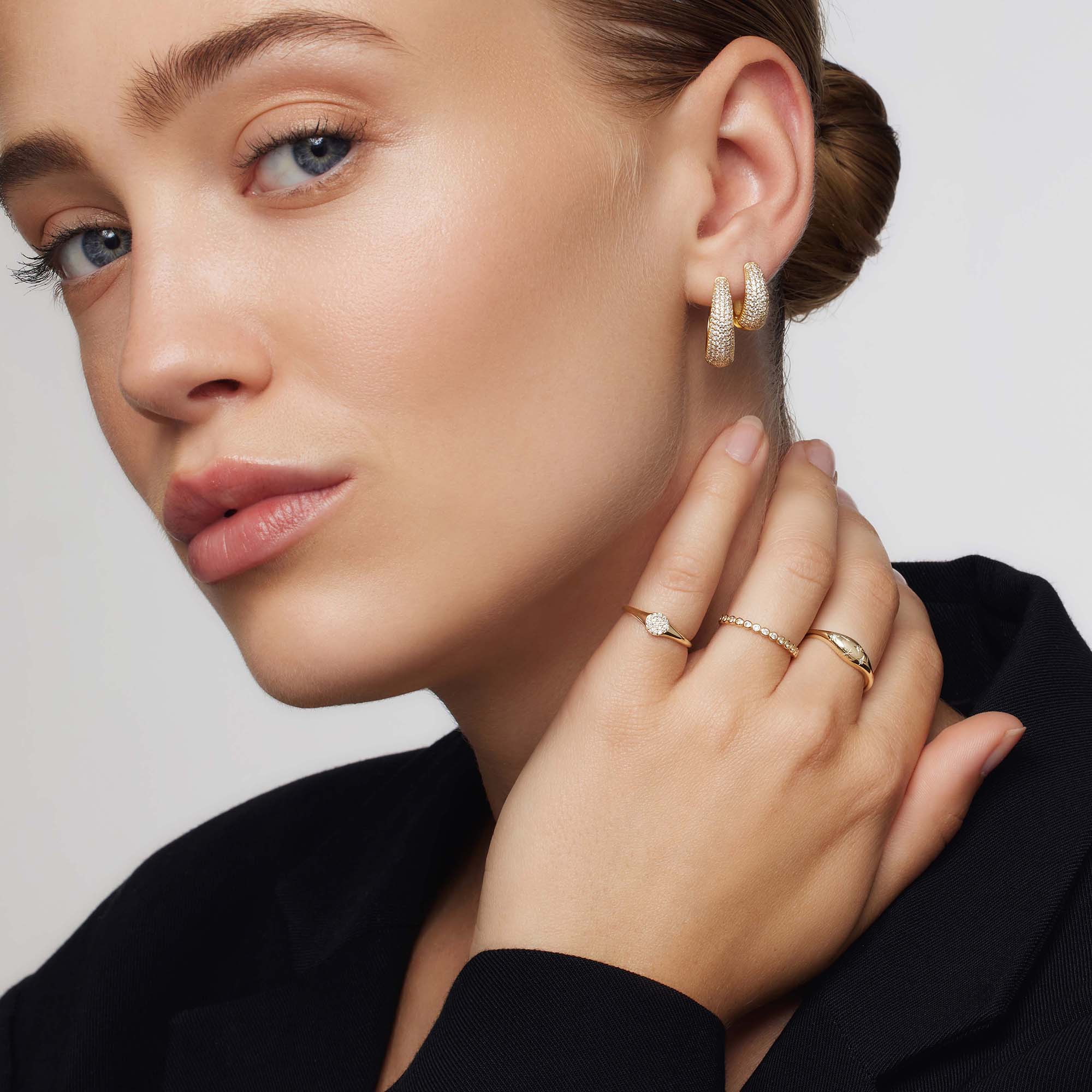 Golden ring in the shape of a diamond
